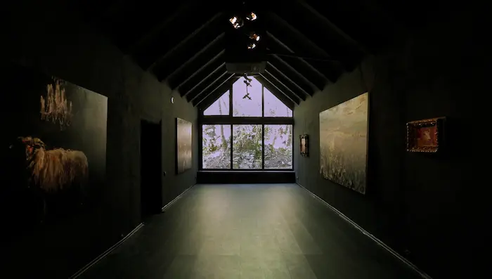 Visitors viewing art in the gallery